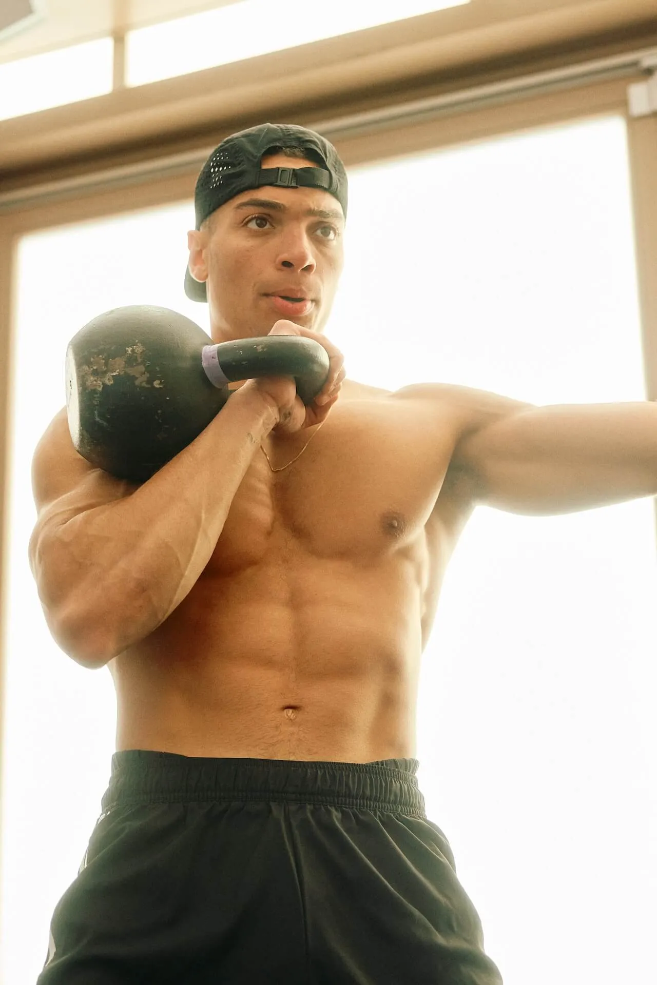 Kofi Boateng doing kettle bell exercises