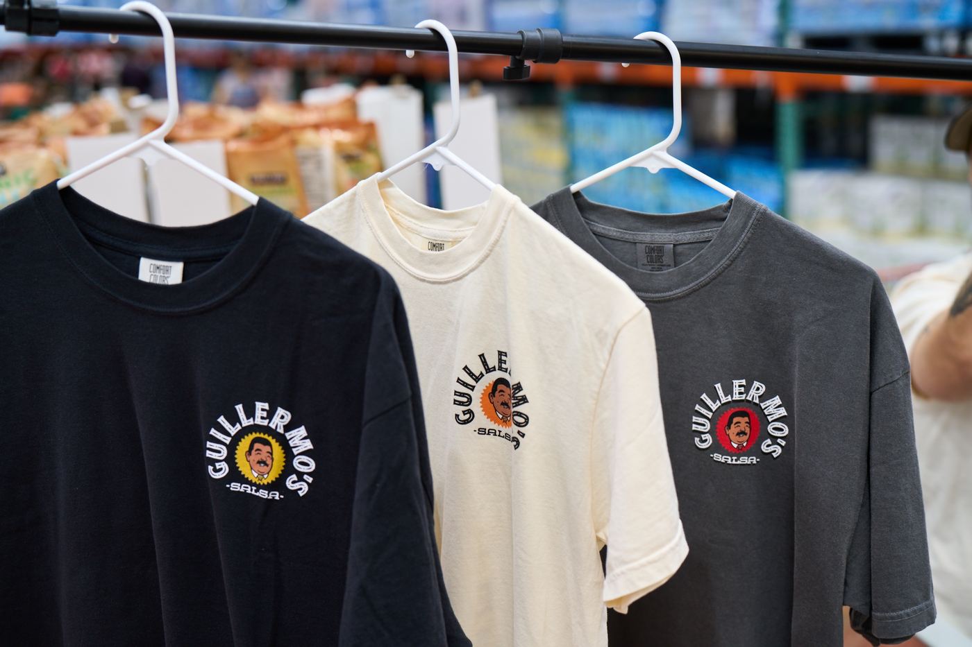 Tees on hangers in the warehouse