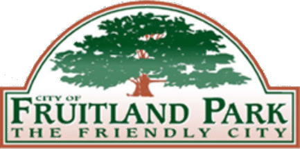 City of Fruitland Park logo featuring a large green tree with the text 'Fruitland Park The Friendly City'.