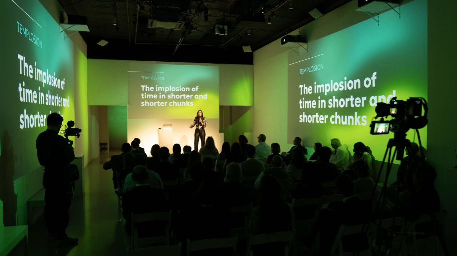 Panel discussion at LUME Studios with immersive backdrop