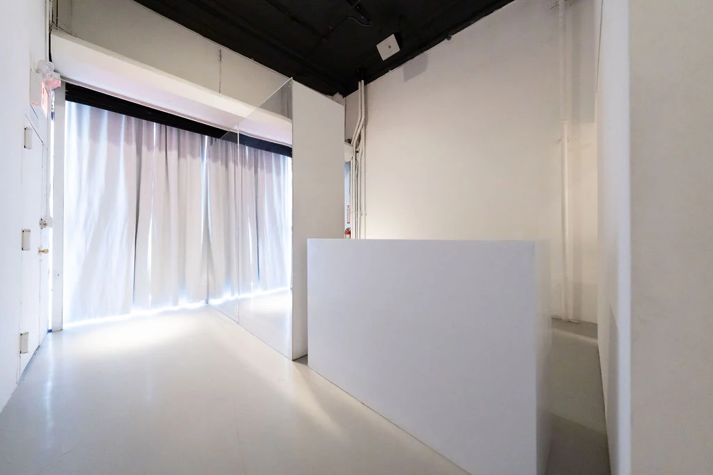 Immersive Studio white box curtain entry