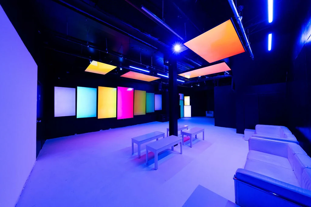 Basement Lounge colorful screens with blue light