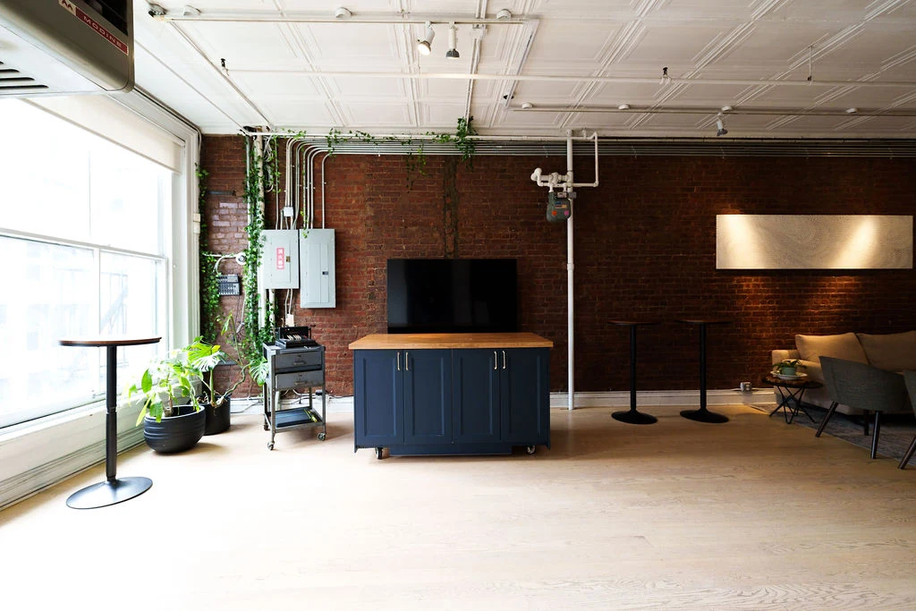 LOFT 4 kitchen island with brick wall