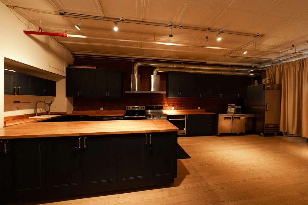 Fourth Floor Kitchen wide: full island and commercial appliances