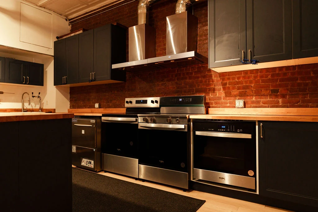 LUME Studios — Loft 4 full kitchen stainless appliances
