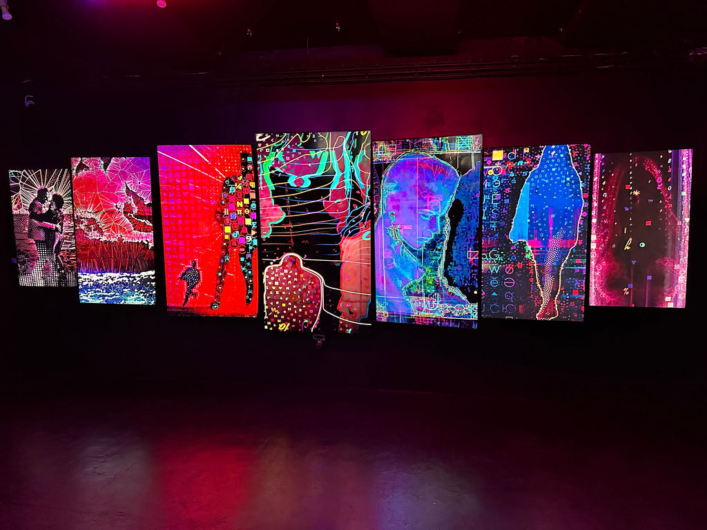 Panel discussion at LUME Studios with immersive backdrop