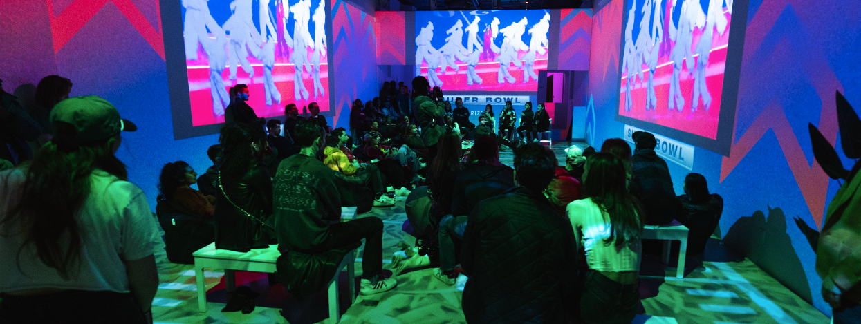 Panel discussion at LUME Studios with immersive backdrop