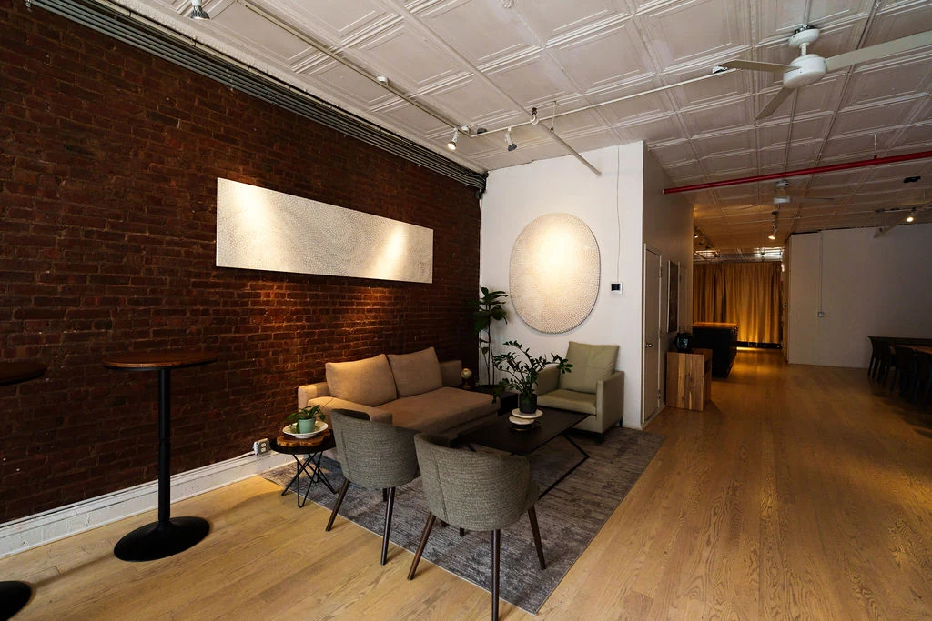 LUME Studios — Loft 4 dining lounge brick wall seating