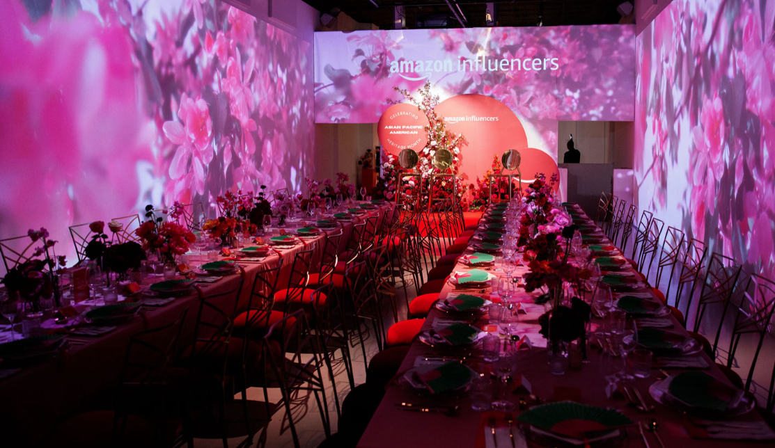 Panel discussion at LUME Studios with immersive backdrop