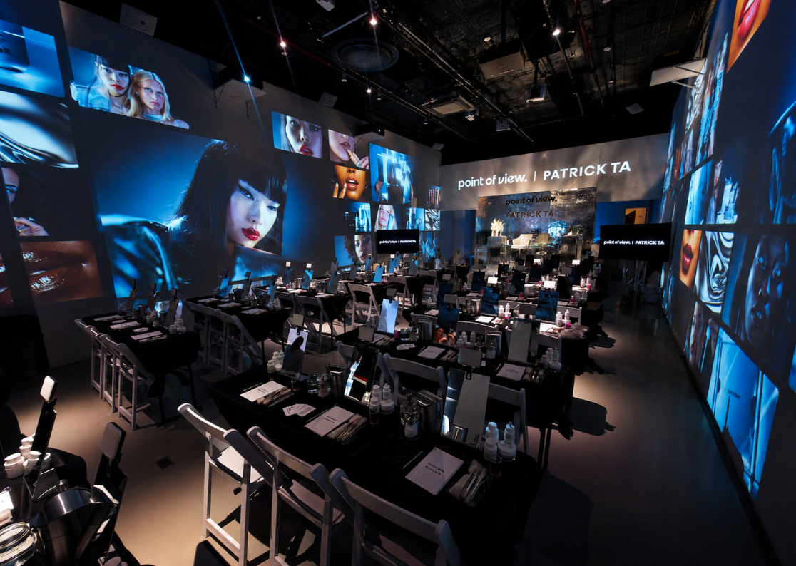 Panel discussion at LUME Studios with immersive backdrop