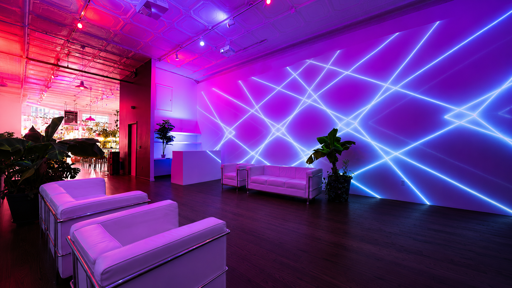 LOFT 2 lounge setup with laser projections during a brand event