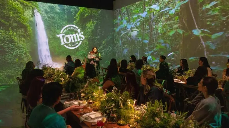Immersive private dinner with jungle waterfall projections in the Immersive Studio