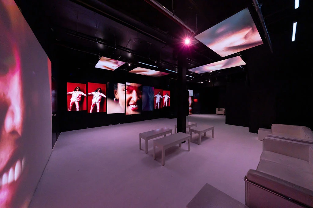 Basement Lounge seating with synchronized video displays