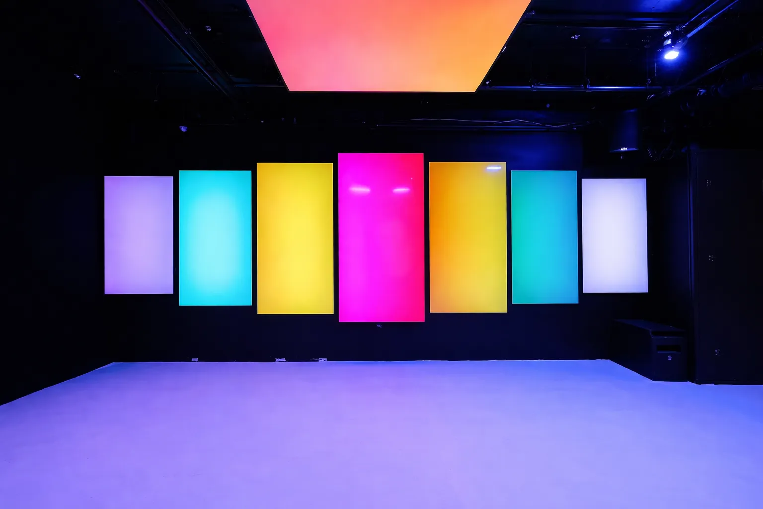 Basement Lounge wrapped in colorful screen panels