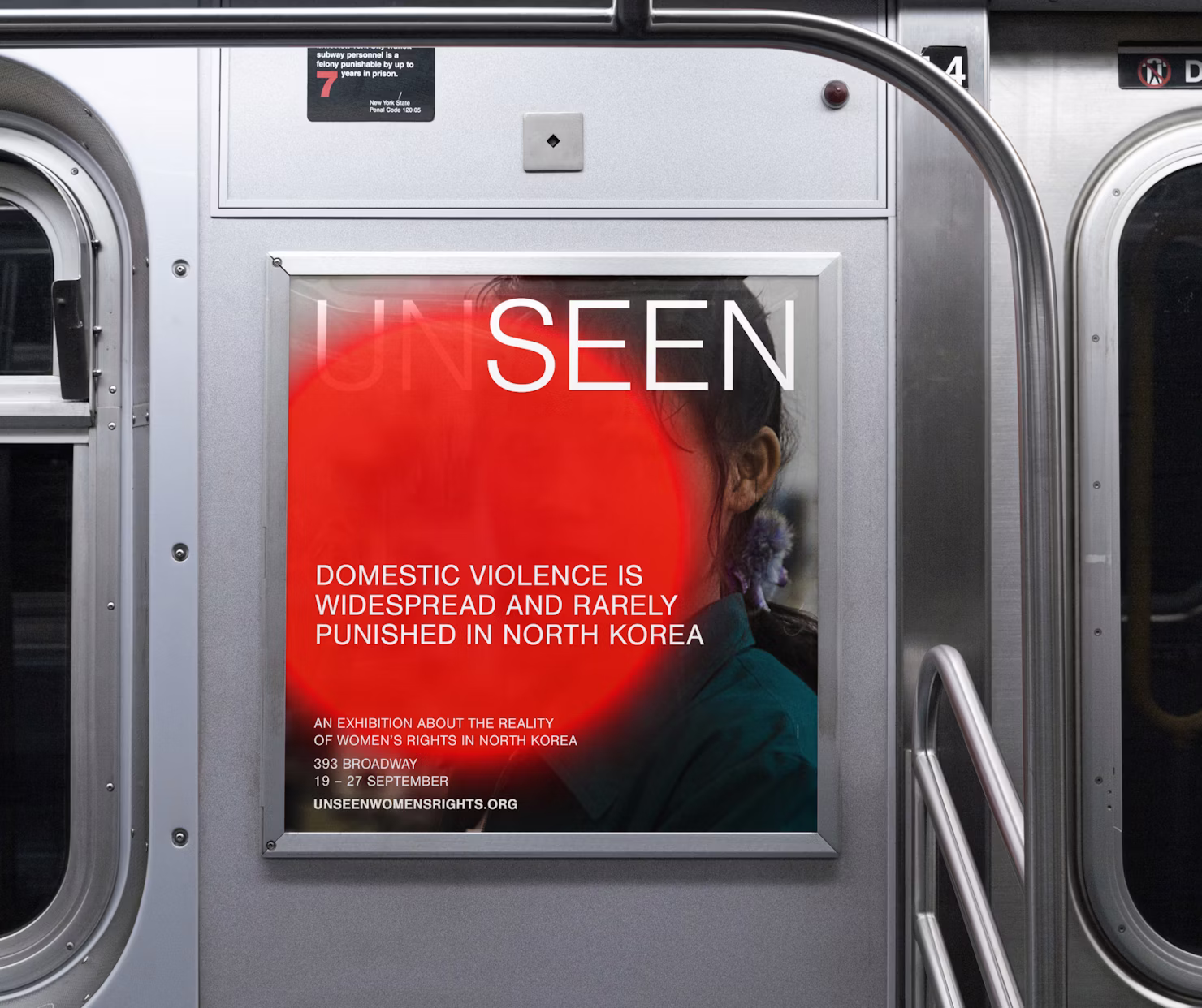 UNSEEN exhibition subway ad about women's rights in North Korea, showing 393 Broadway
