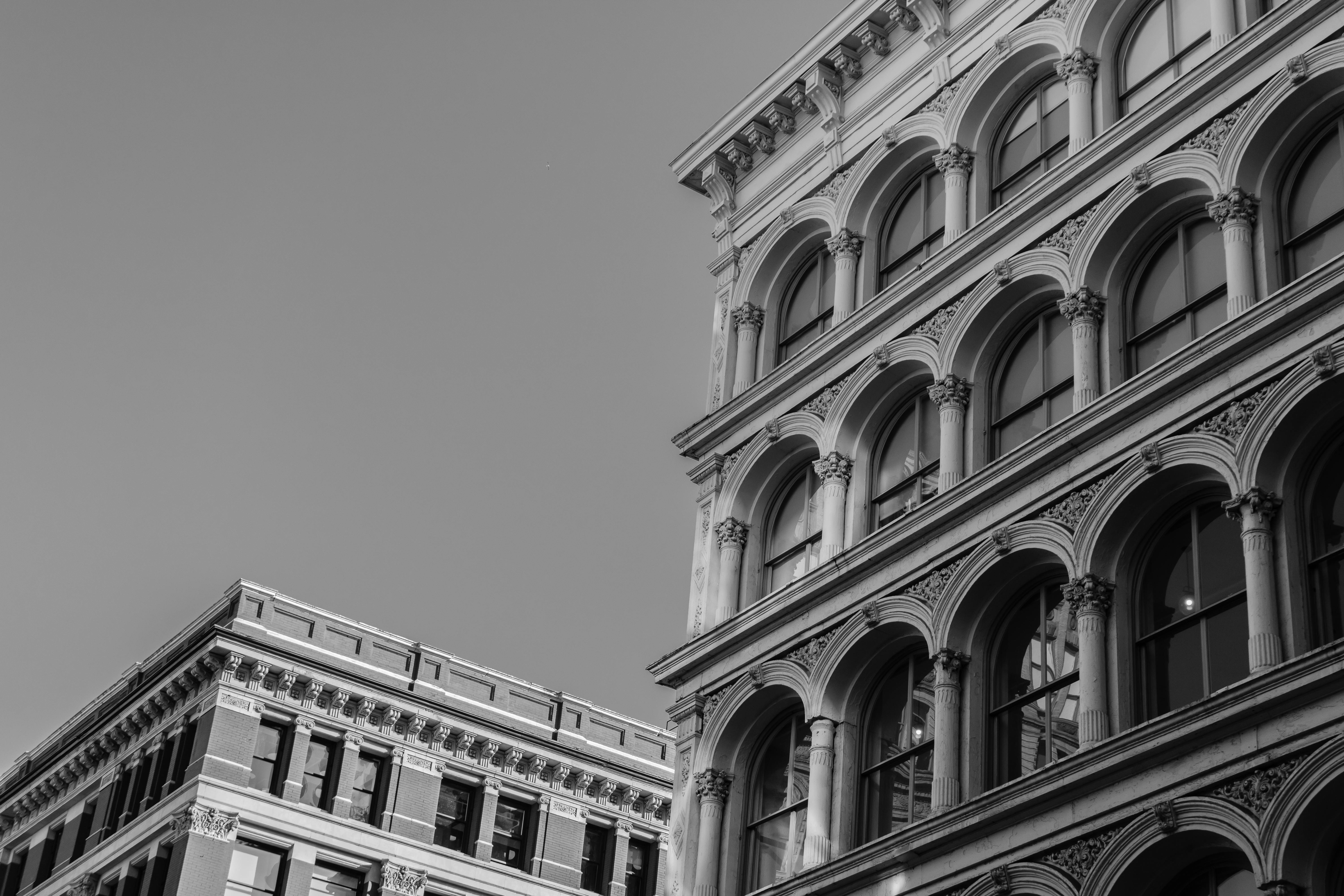 Cast iron building facades in black and white in downtown Manhattan