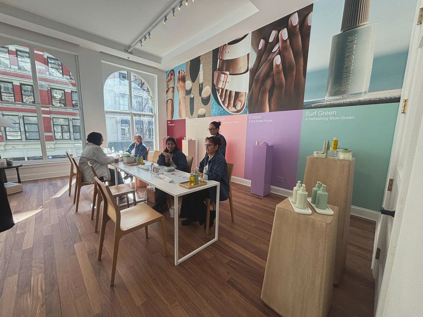 Birkenstock off-site showroom, guests product wall, lighting and projection by LUME Studios