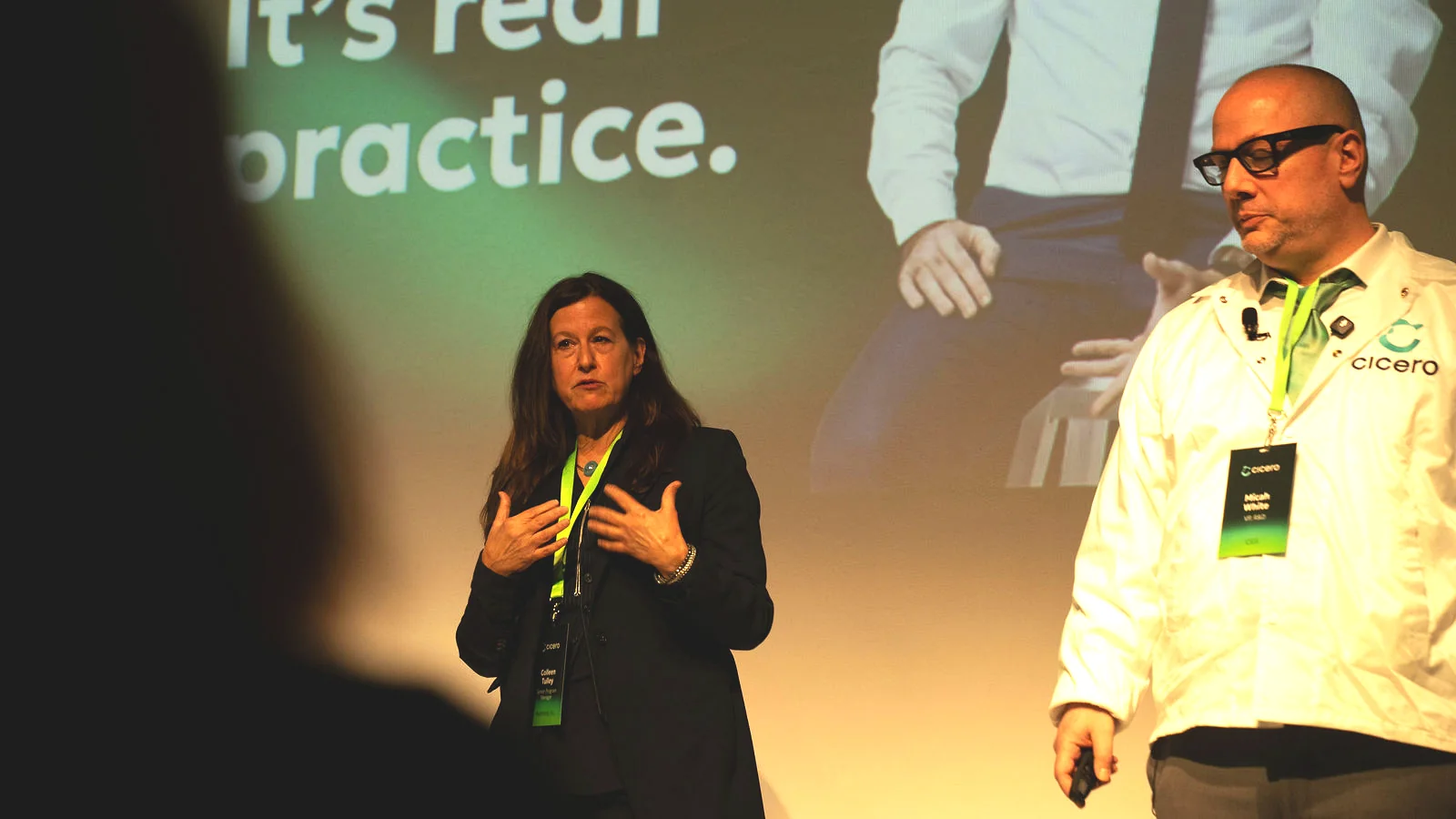 Cicero presentation at LUME Studios, two speakers on stage