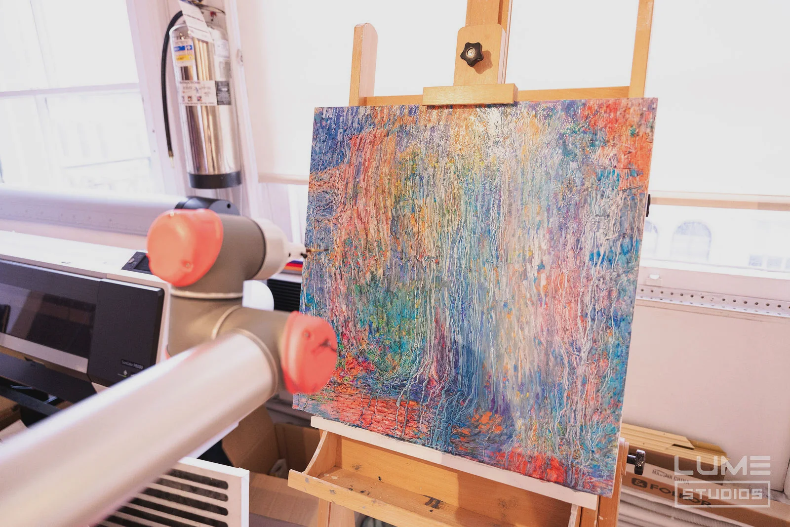 SUBJECTIVE Art Festival at LUME Studios, 393 Broadway, painting on easel