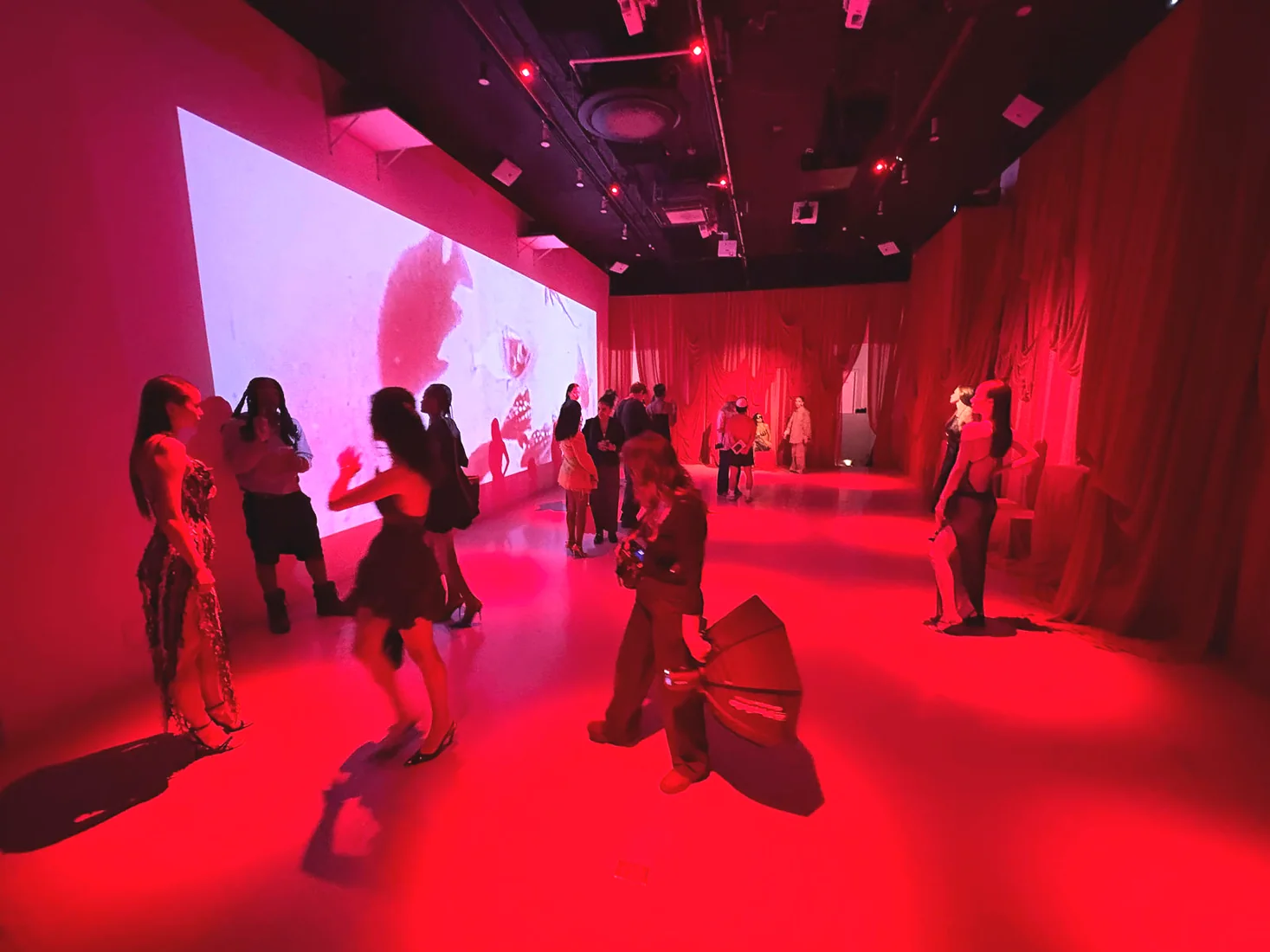 HILA SS27 presentation at LUME Studios, room projection guests