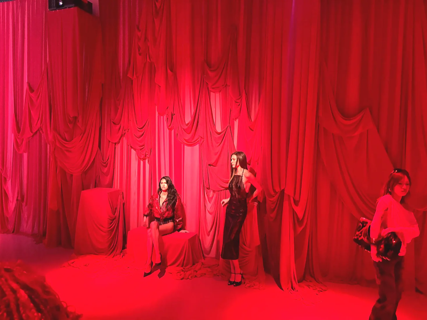 HILA SS27 presentation at LUME Studios, red drape crowd
