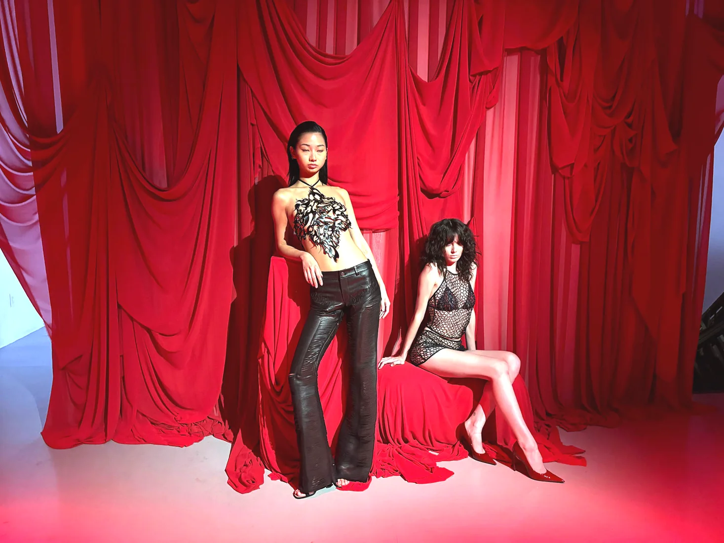 HILA SS27 presentation at LUME Studios, models red drape
