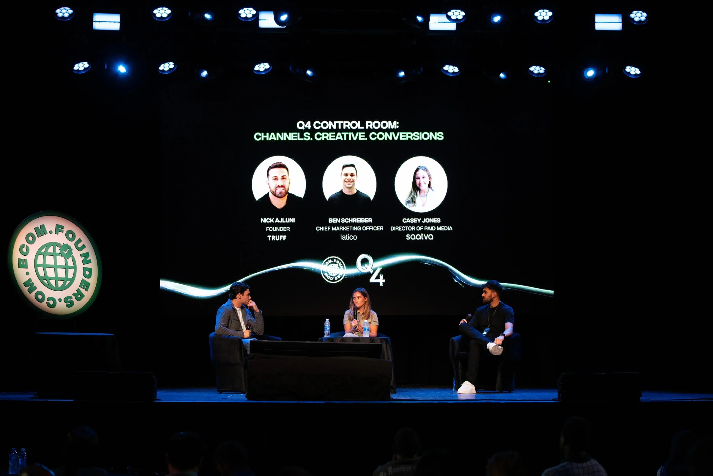 Q4 Control Room panel on the Webster Hall stage with speaker graphics on the LED wall at the Ecom Founders Q4 Summit 2025.
