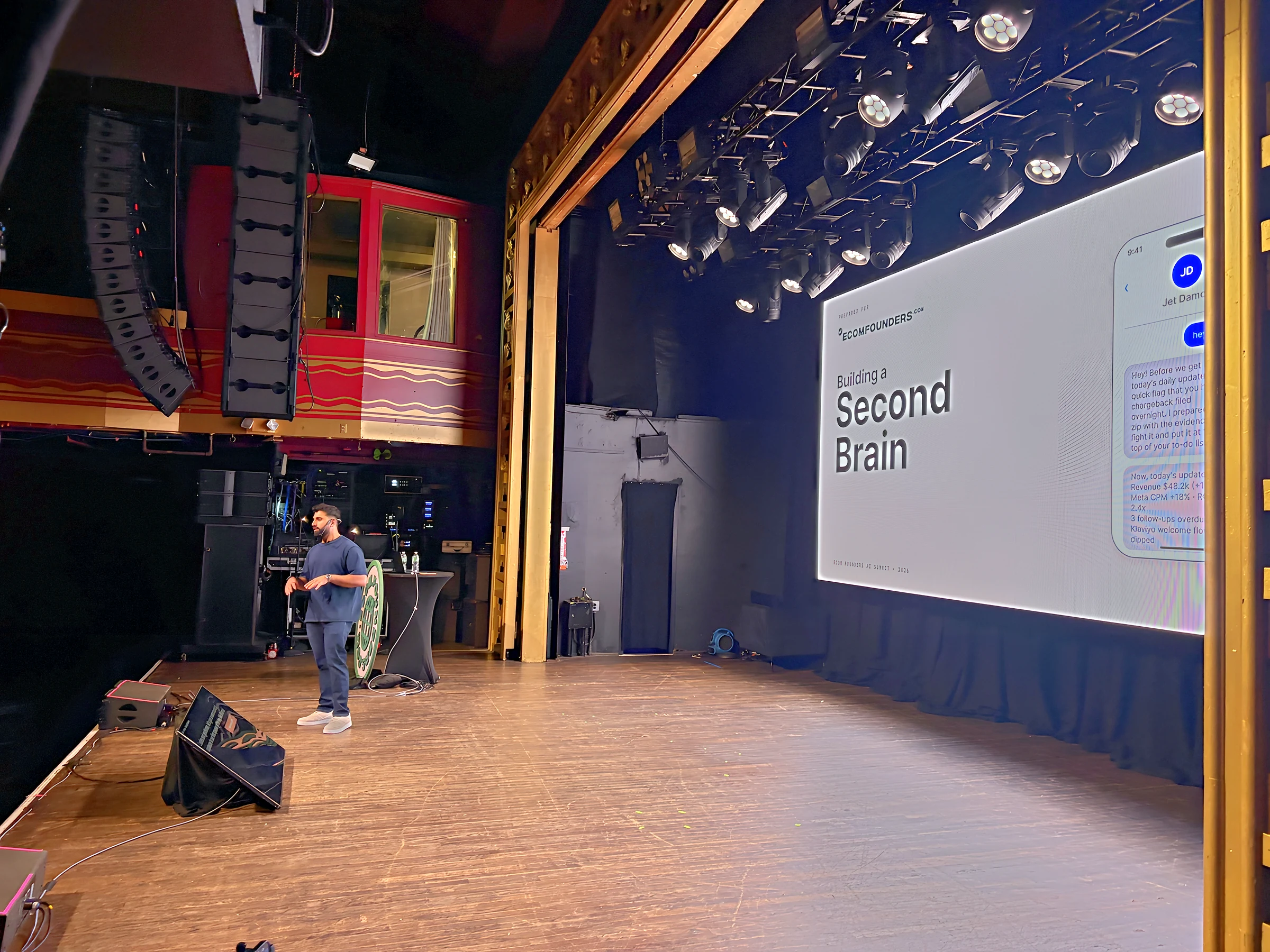 A speaker presents Building a Second Brain on the LED wall at the Ecom AI Summit 2026.