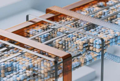 Close-up of a mechanical bead maze toy with white, blue, and beige beads moving along metal rods within a transparent wooden frame.