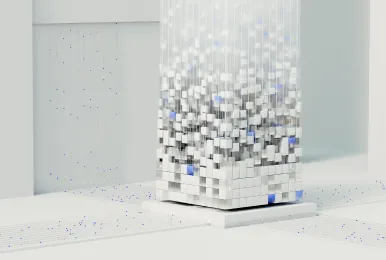 Abstract white cubic tower with scattered blue cubes on a white minimalist surface.