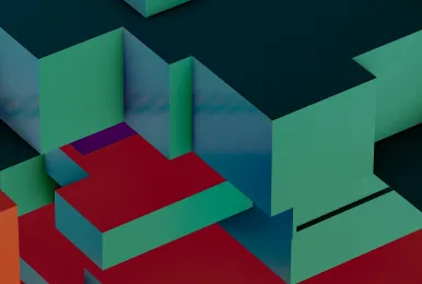Abstract 3D geometric shapes in green, blue, and red arranged in a layered pattern.