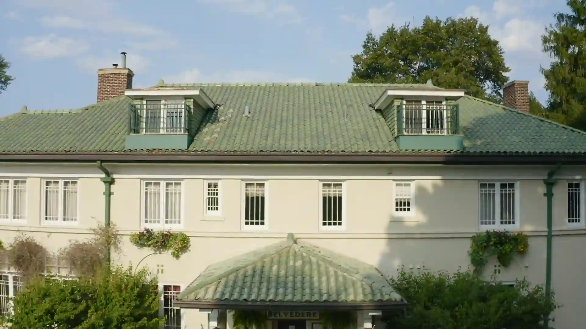 Front exterior of historic Belvedere Estate mansion in Saugatuck, Michigan