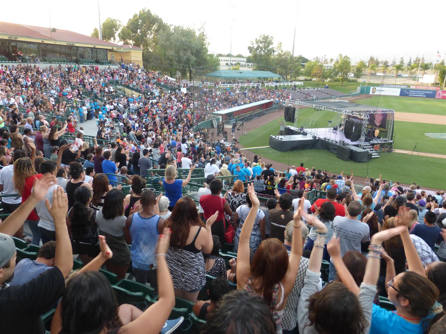 Outdoor crowd gathered for a Nazareth live comedy performance
