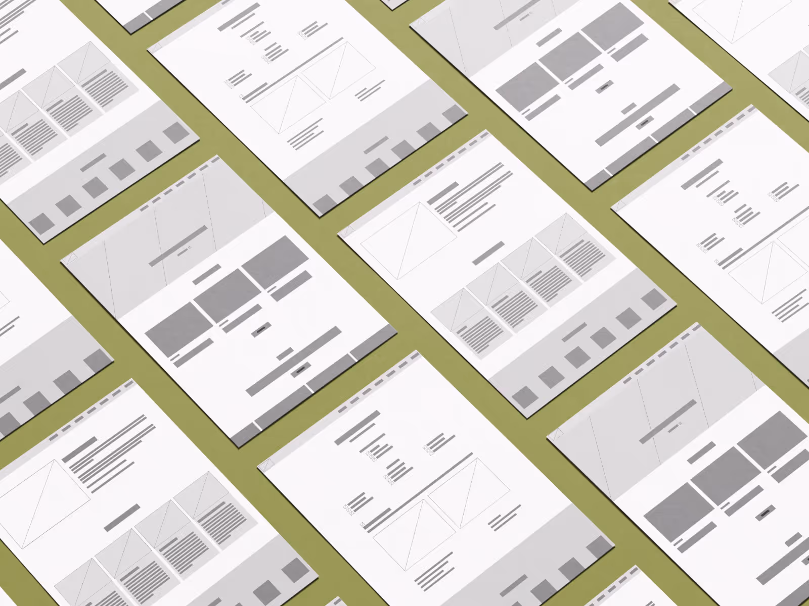 Isometric view of multiple website wireframe mockups arranged in rows on a green surface.
