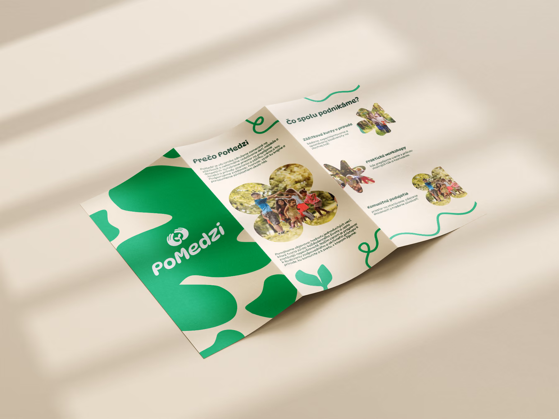 Tri-fold flyer for PoMedzi showing children playing outside and green abstract shapes.