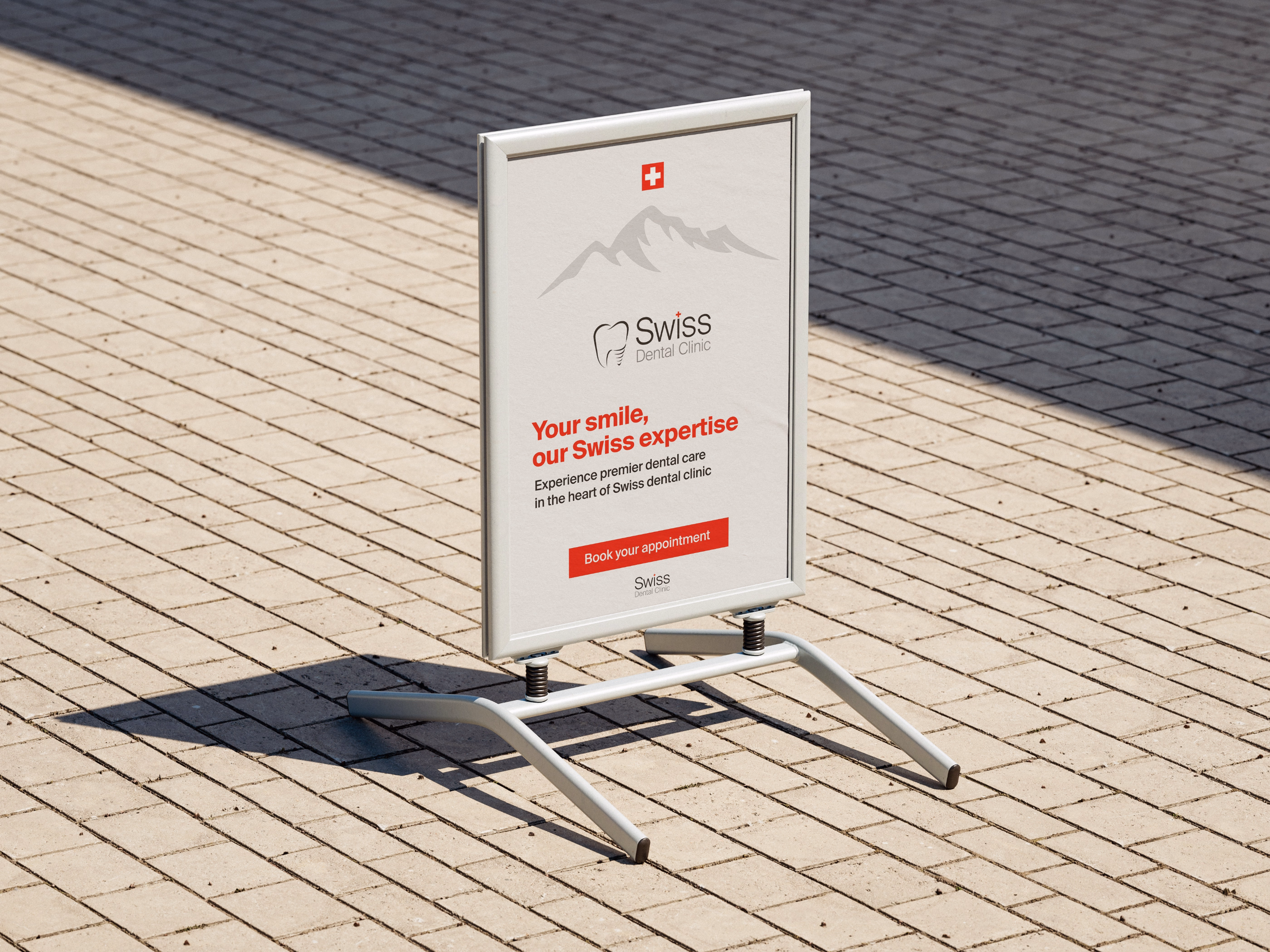 Outdoor A-frame signboard on a tiled pavement advertising Swiss Dental Clinic with text: Your smile, our Swiss expertise. Experience premier dental care in the heart of Swiss dental clinic. Book your appointment.