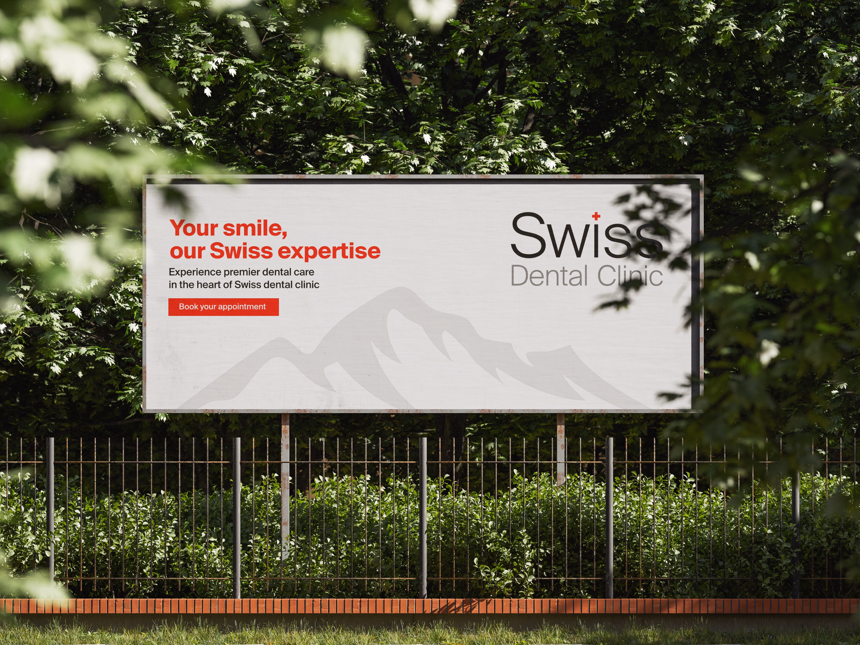 Outdoor billboard surrounded by greenery advertising Swiss Dental Clinic with text highlighting premier dental care and an appointment booking button.