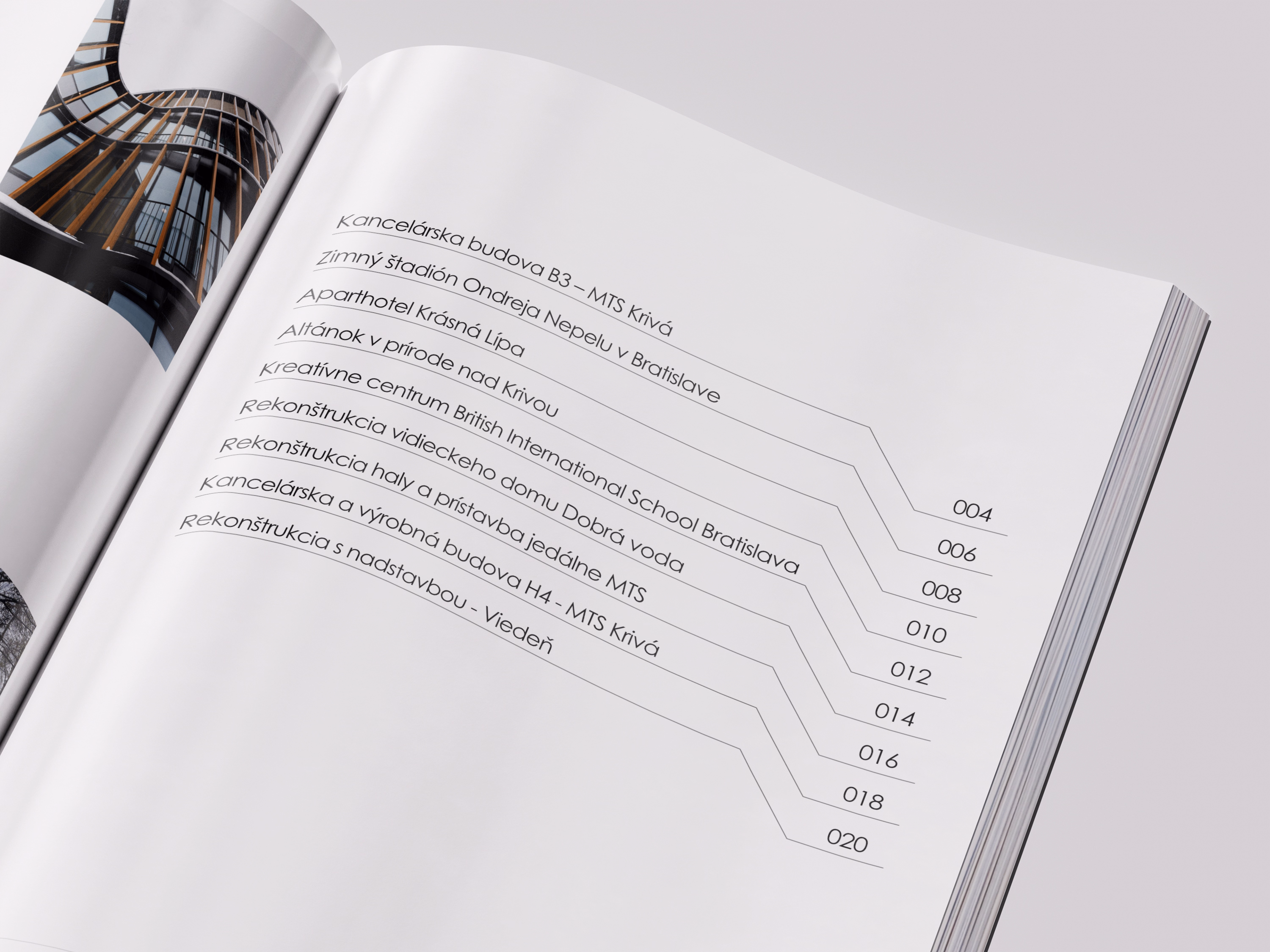 Open magazine page displaying a list of architectural projects with corresponding page numbers, including office buildings, a winter stadium, an aparthotel, a nature shelter, a creative center, and various reconstructions located in Bratislava and Vienna.
