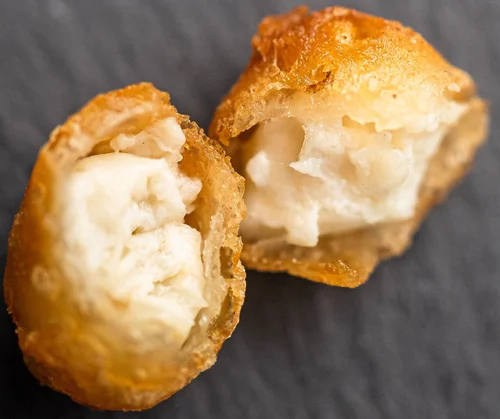 Close up of BlueNalu's whole-muscle, cell-based yellowtail, beer-battered and deep-fried for fish tacos.