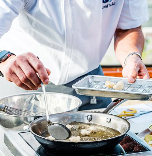 BlueNalu Corporate Chef Gerard Viverito demonstrates BlueNalu's whole-muscle, cell-based yellowtail that is beer-battered and deep-fried for fish tacos.
