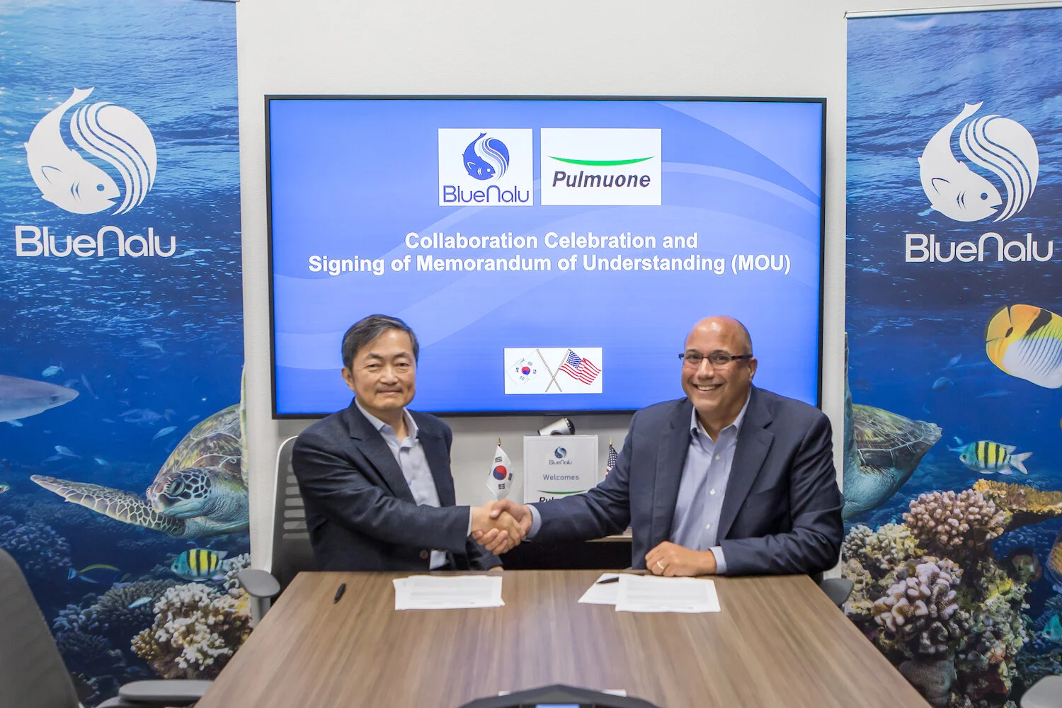 Left to right) Sang Yun Lee, CTO of Pulmuone Co. Ltd. and Lou Cooperhouse, CEO of BlueNalu celebrate signing of MOU at BlueNalu headquarters (pre-pandemic).