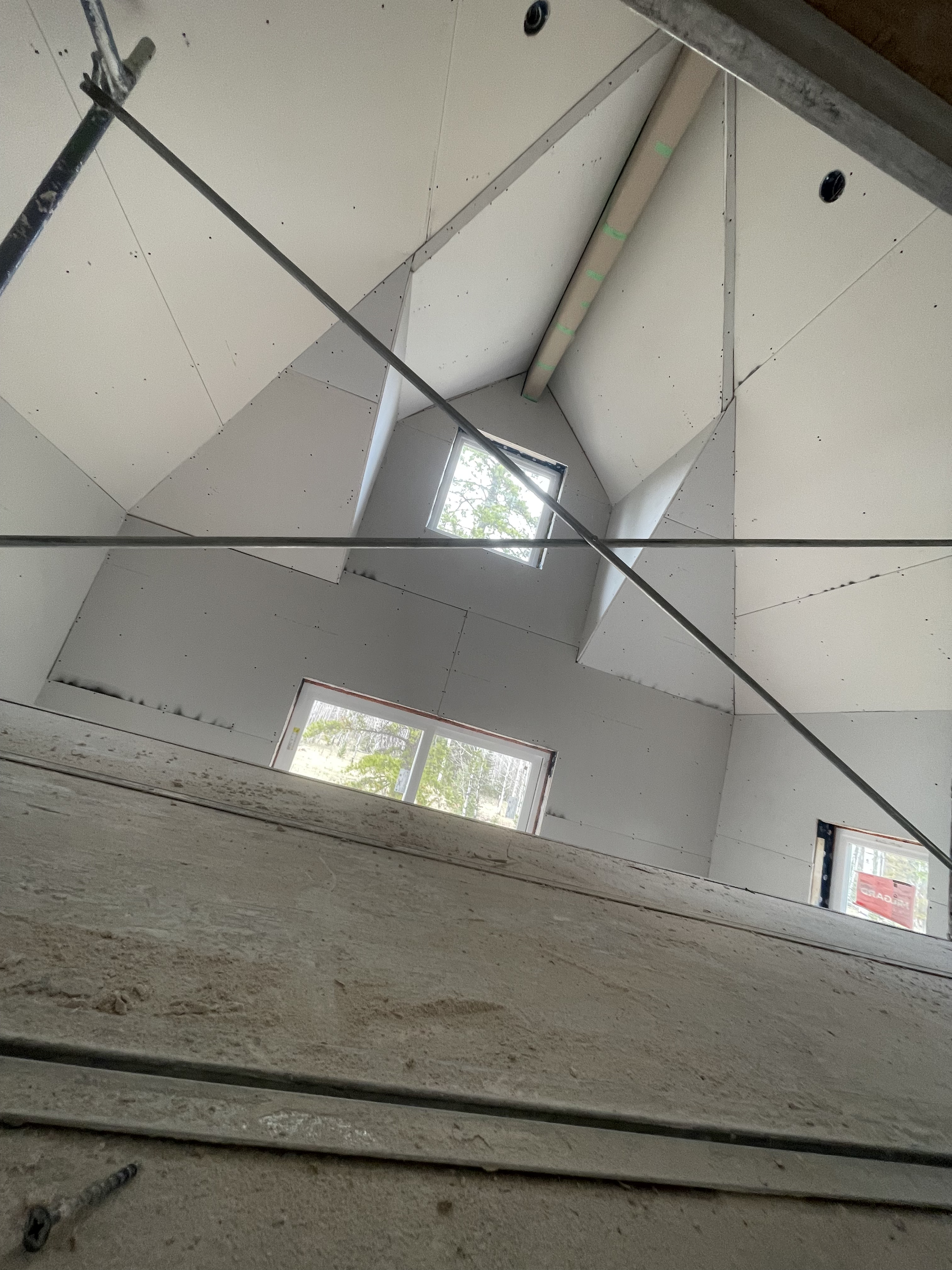 Vapour barrier sealed at penetrations on a Calgary jobsite