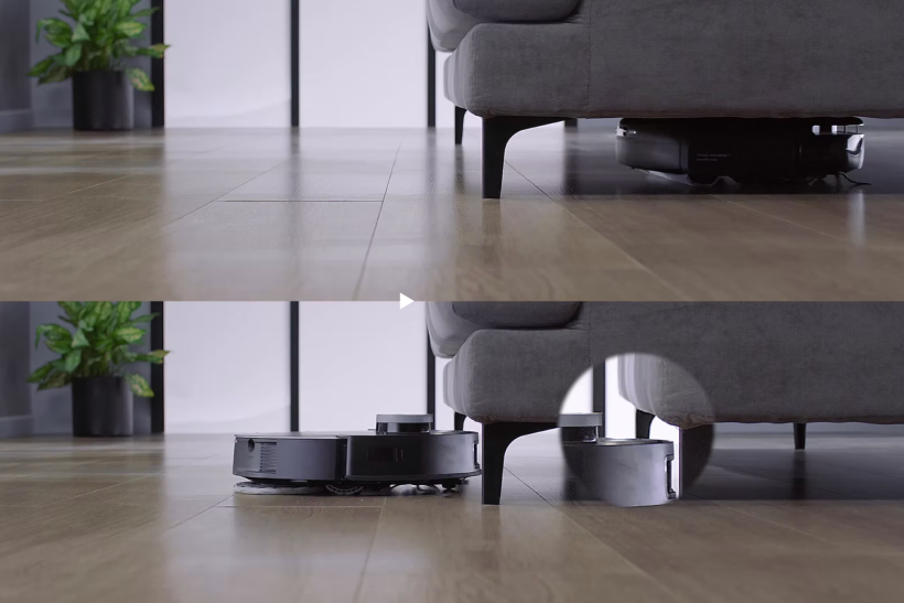 Two images showing a black robotic vacuum cleaner moving under a gray sofa on a wooden floor in a modern living room.