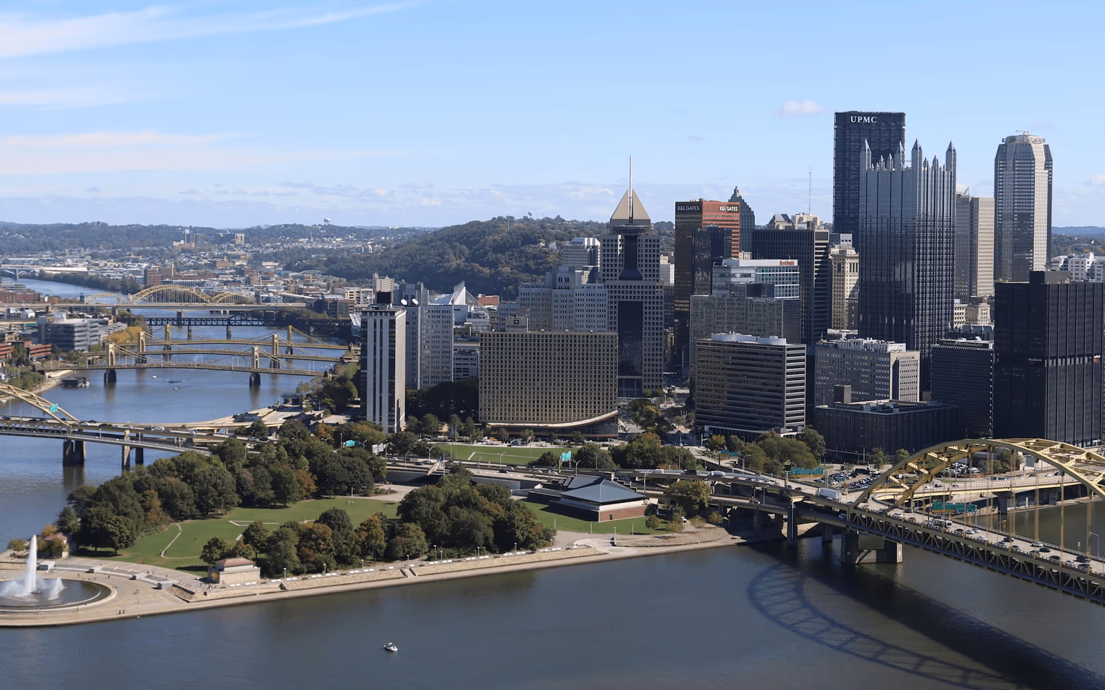 City skyline with river and bridges, representing established private wealth management presence.