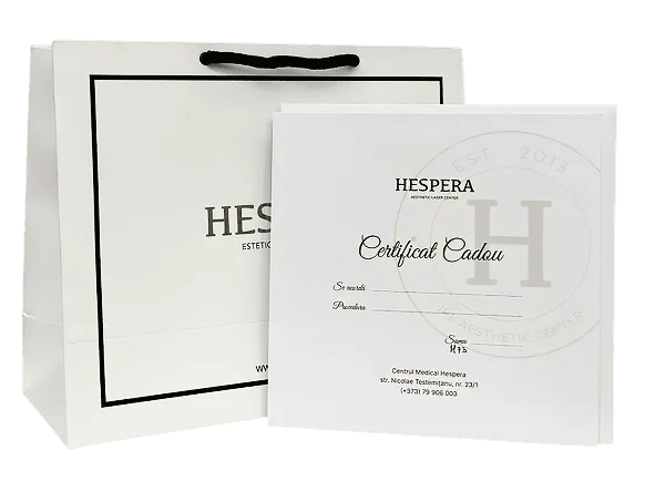 White gift bag and gift certificate from Hespera Aesthetic Laser Center.