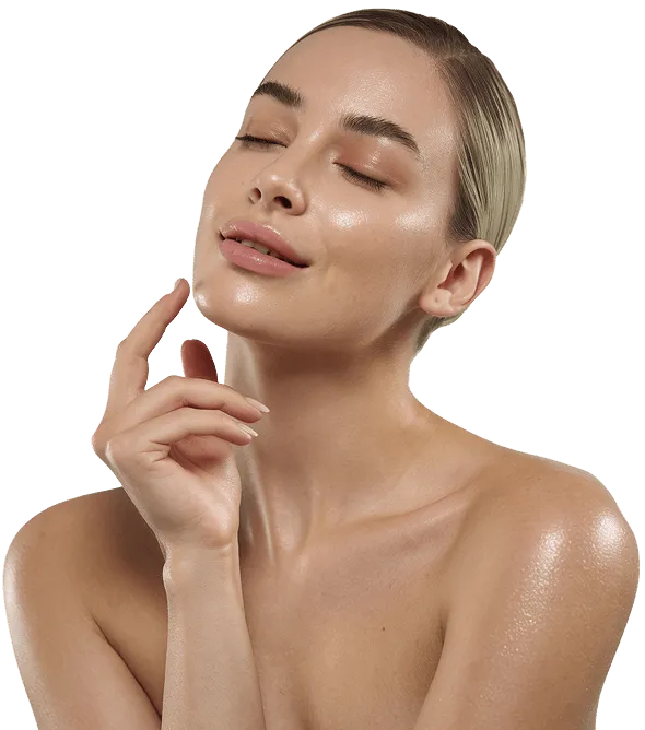 Close-up of a woman with clear, glowing skin and closed eyes gently touching her face, suggesting skincare or beauty.