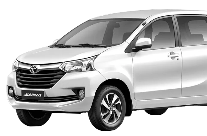 Silver Toyota Avanza compact MPV viewed from the front side, showing headlights, grille, and front wheel.
