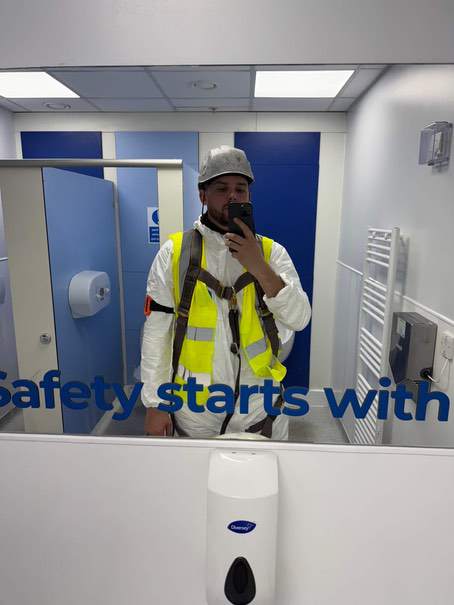 FireCoatings operative wearing protective equipment before coating work.