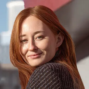 smiley woman posing outdoors