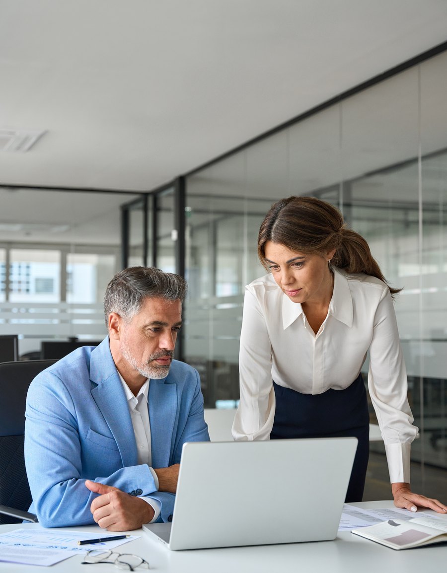 A strategist mapping a plan on a whiteboard